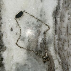 Kendra Scott black pendant with gold chain bracelet